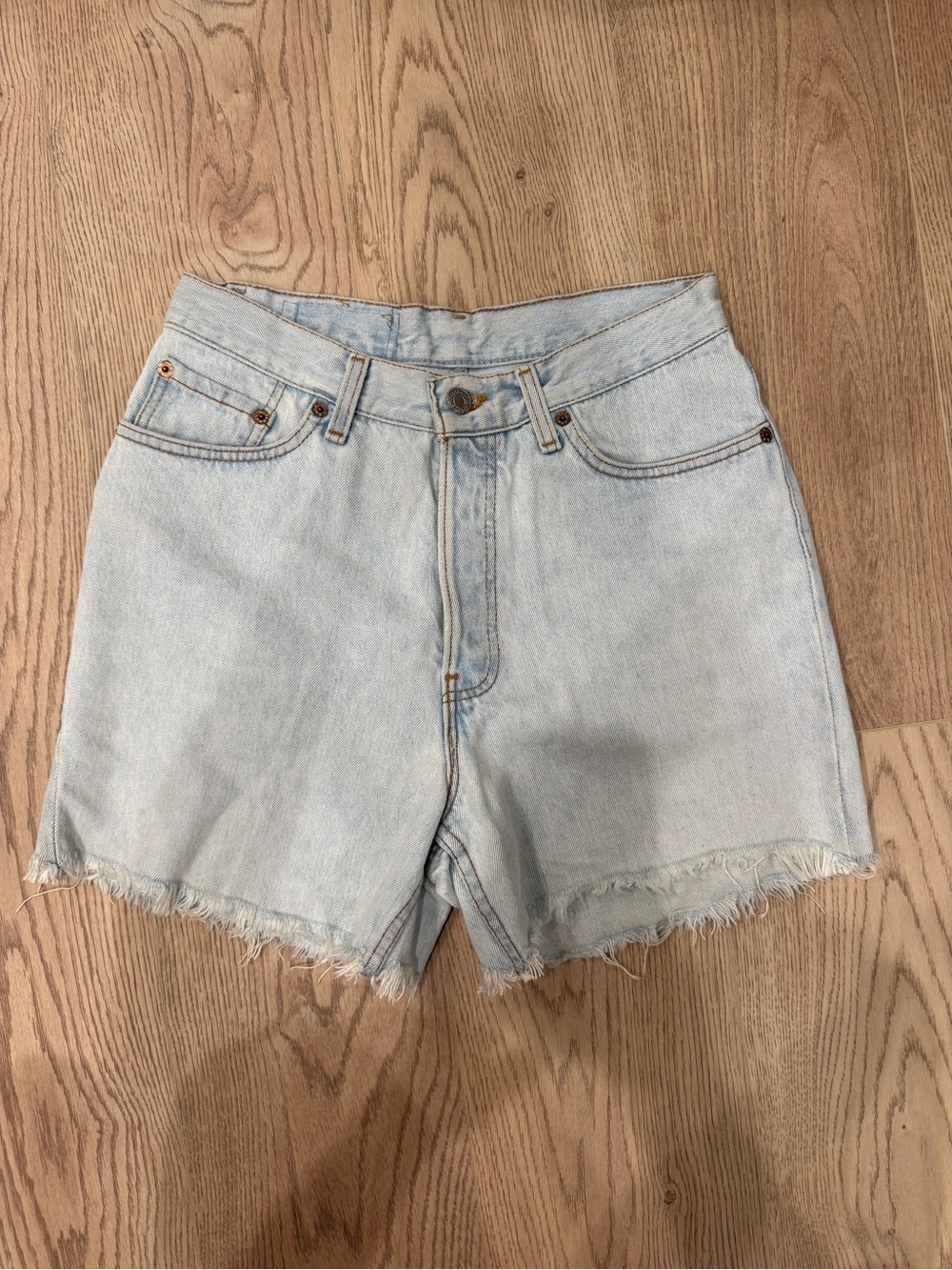 Vintage Levi's Light Wash Frayed Hem Denim Shorts